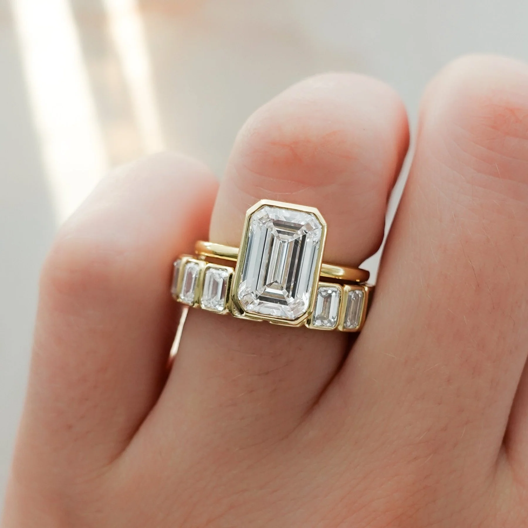 Penumbra Bezel Set Engagement Ring With Emerald Cut - Image 6