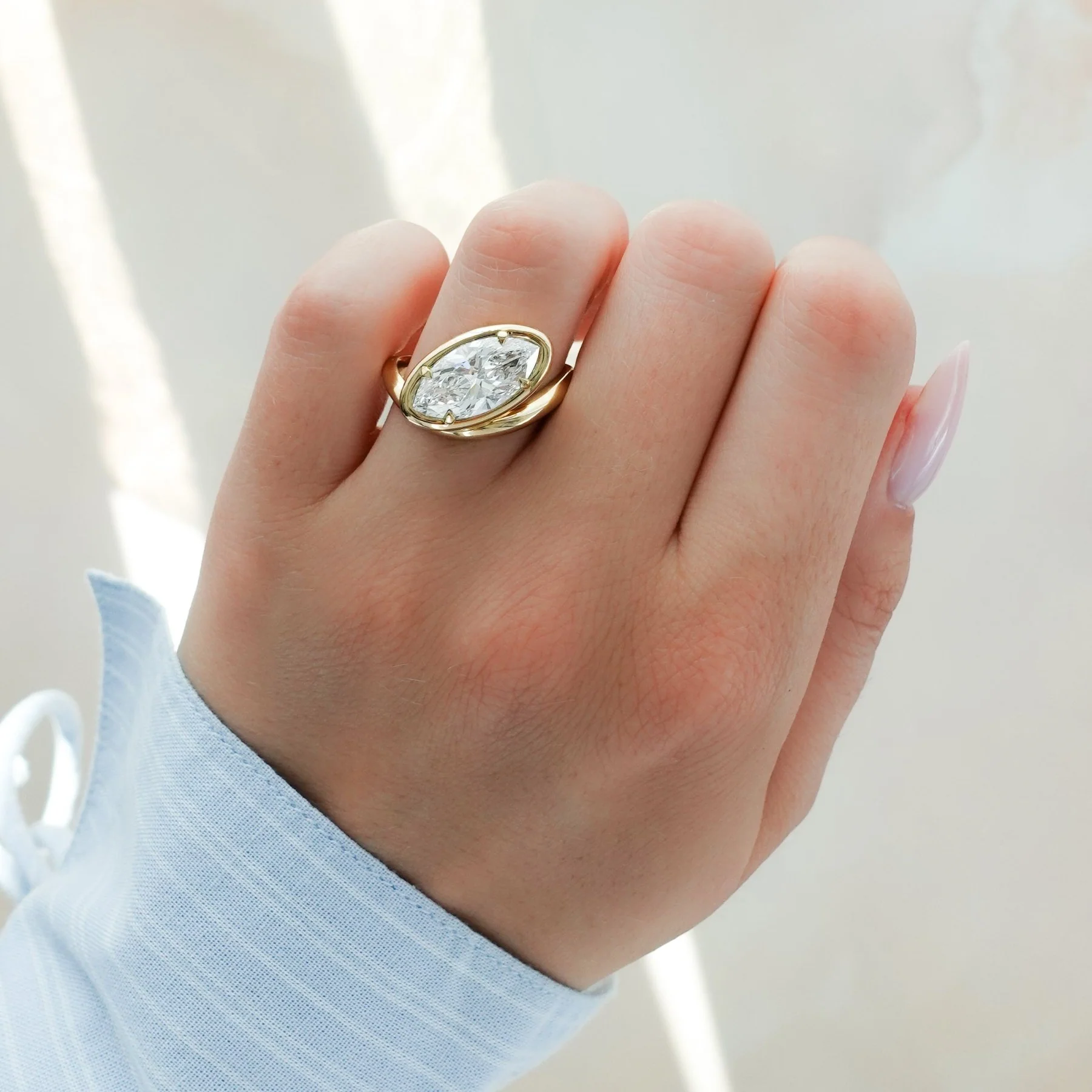 Contoured Club Engagement Ring with a Marquise Cut Diamond - Image 3