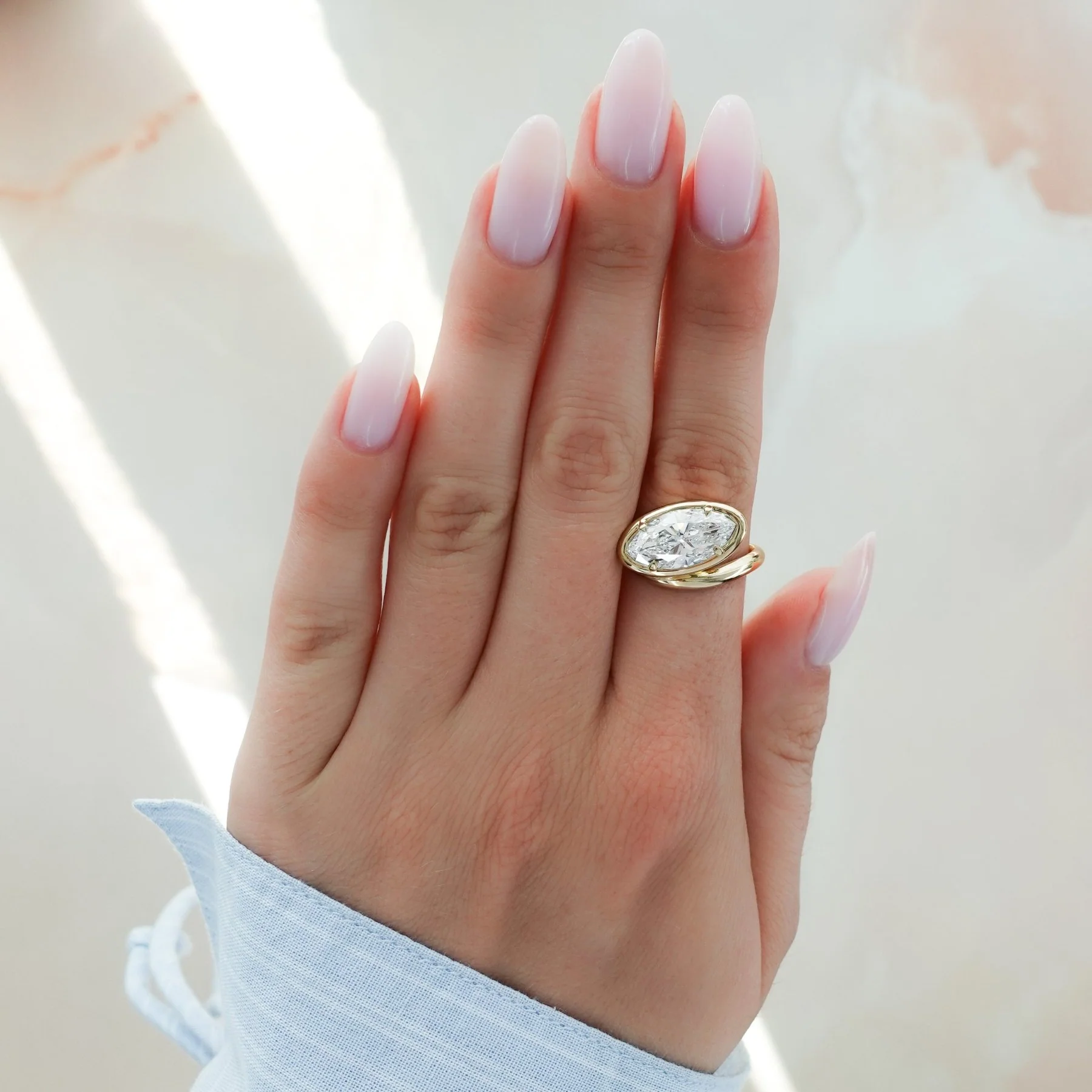 Contoured Club Engagement Ring with a Marquise Cut Diamond - Image 6