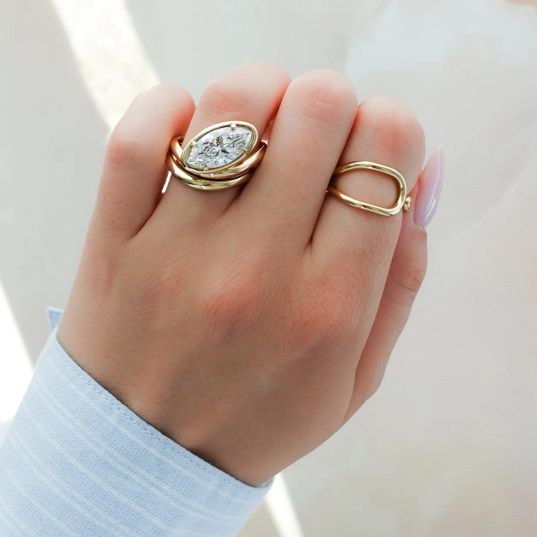 Contoured Club Engagement Ring with a Marquise Cut Diamond - Image 7