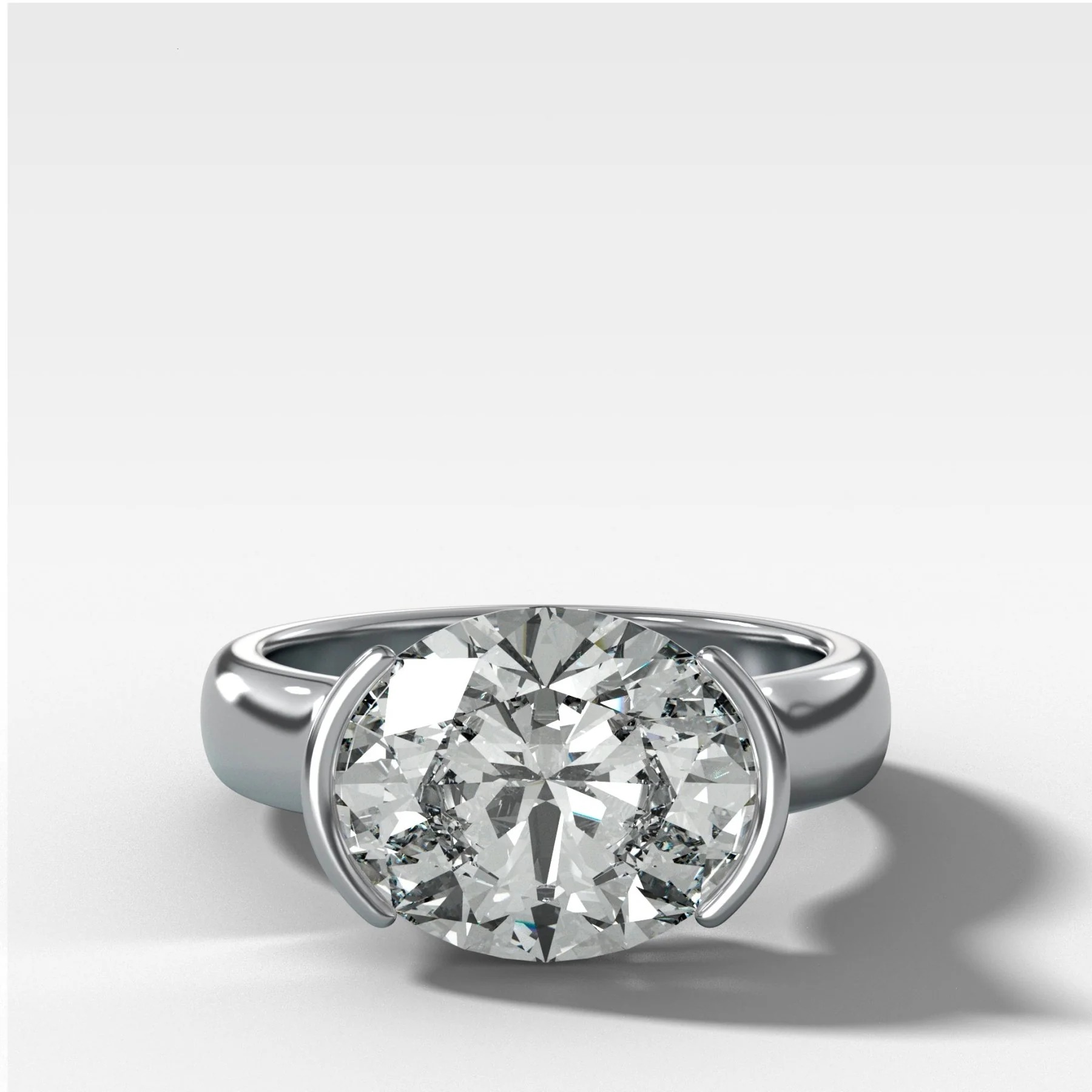 East West Half Bezel 4mm Solitaire Engagement Ring With Oval Cut Diamond - Image 4