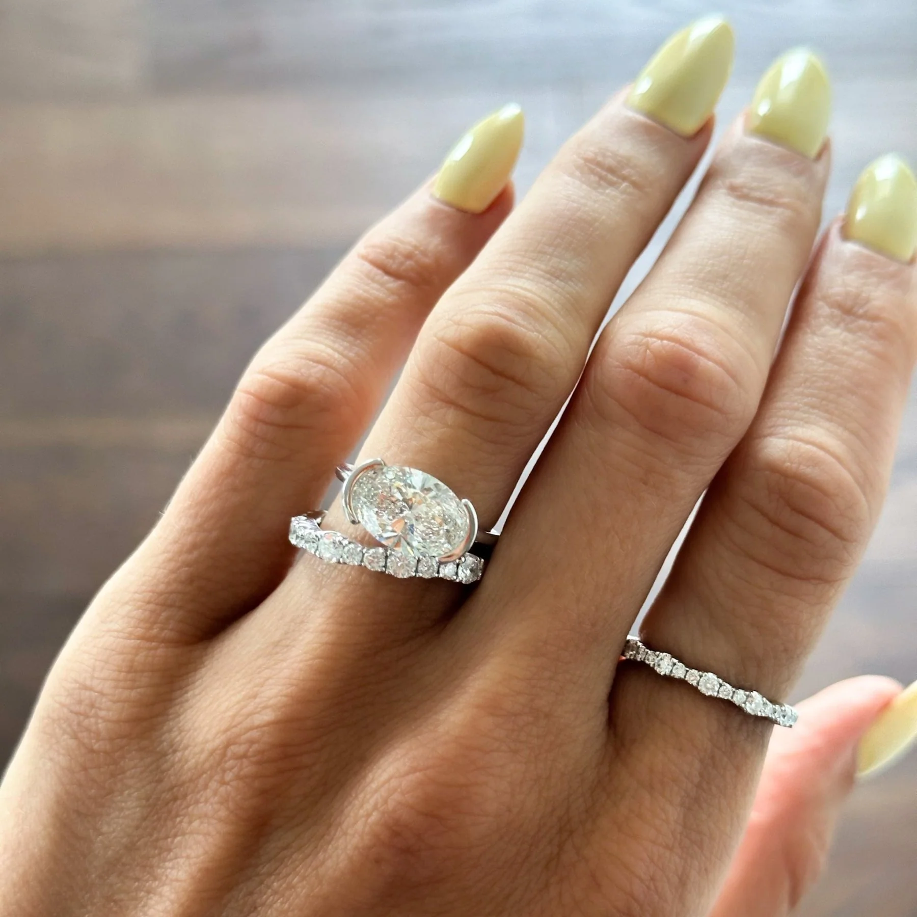 East West Half Bezel Solitaire Engagement Ring With Oval Cut Diamond - Image 3