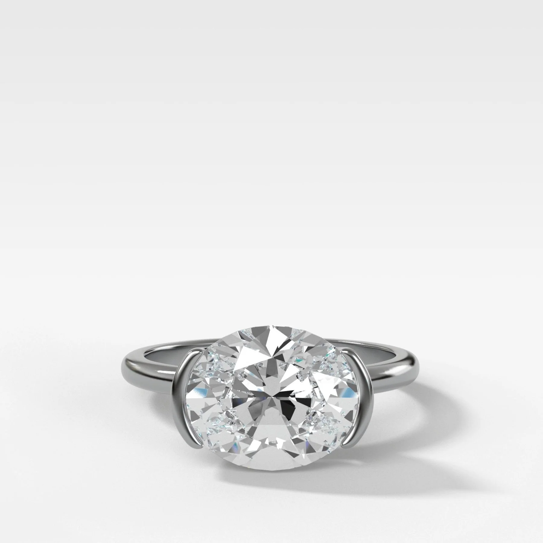 East West Half Bezel Solitaire Engagement Ring With Oval Cut Diamond - Image 5