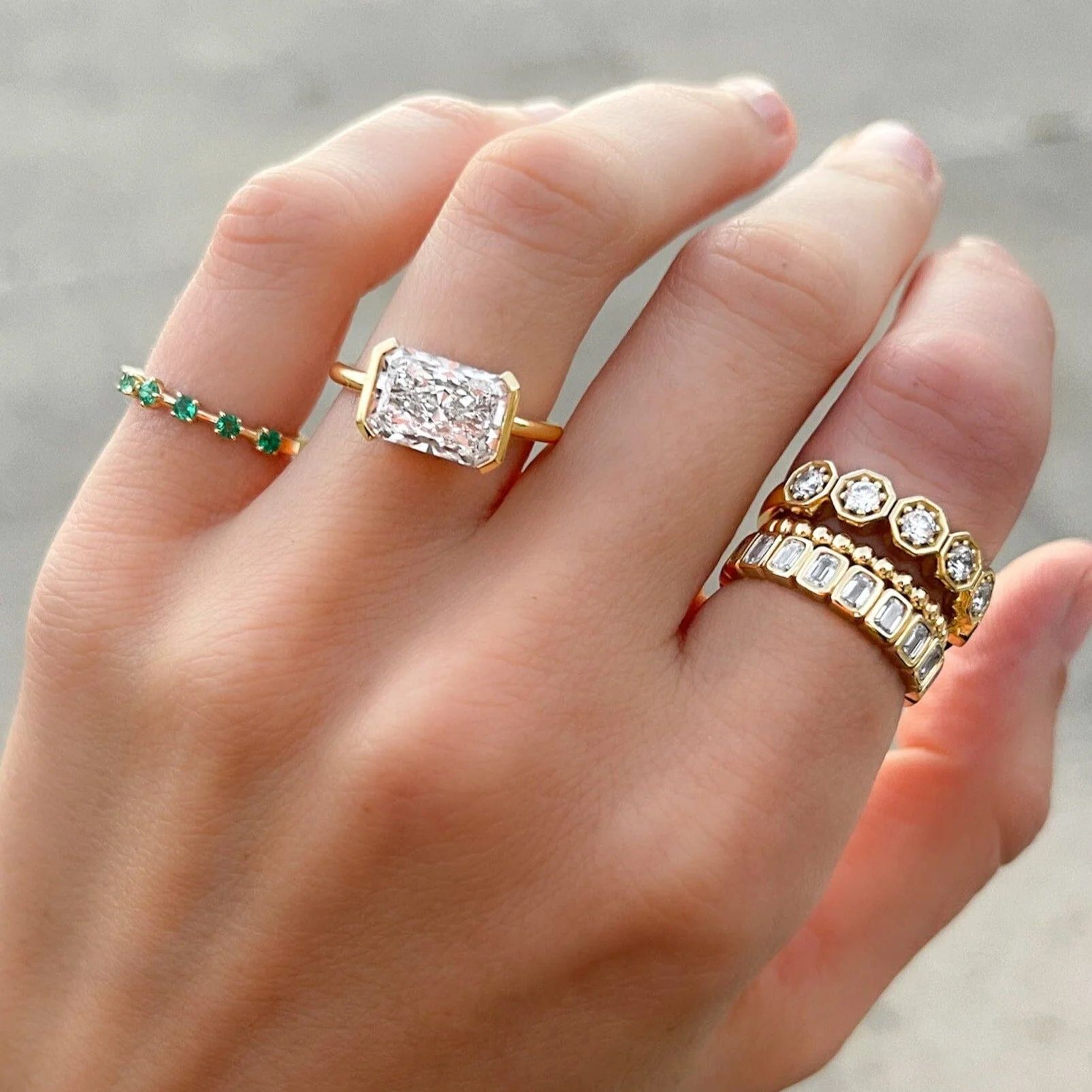 East West Half Bezel Solitaire Engagement Ring With Elongated Radiant Cut Diamond - Image 9