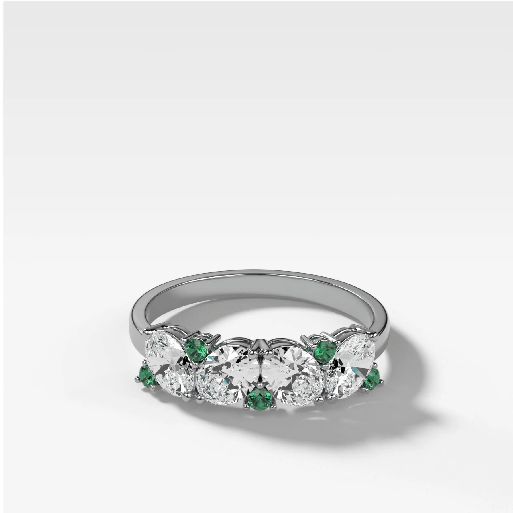 Oval Diamond And Green Emerald Medley Halfway Wedding Band - Image 3
