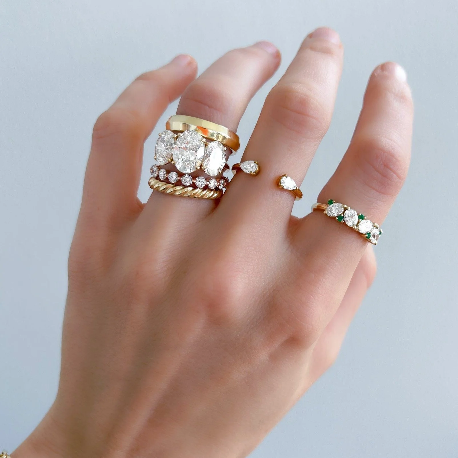 Oval Diamond And Green Emerald Medley Halfway Wedding Band - Image 5