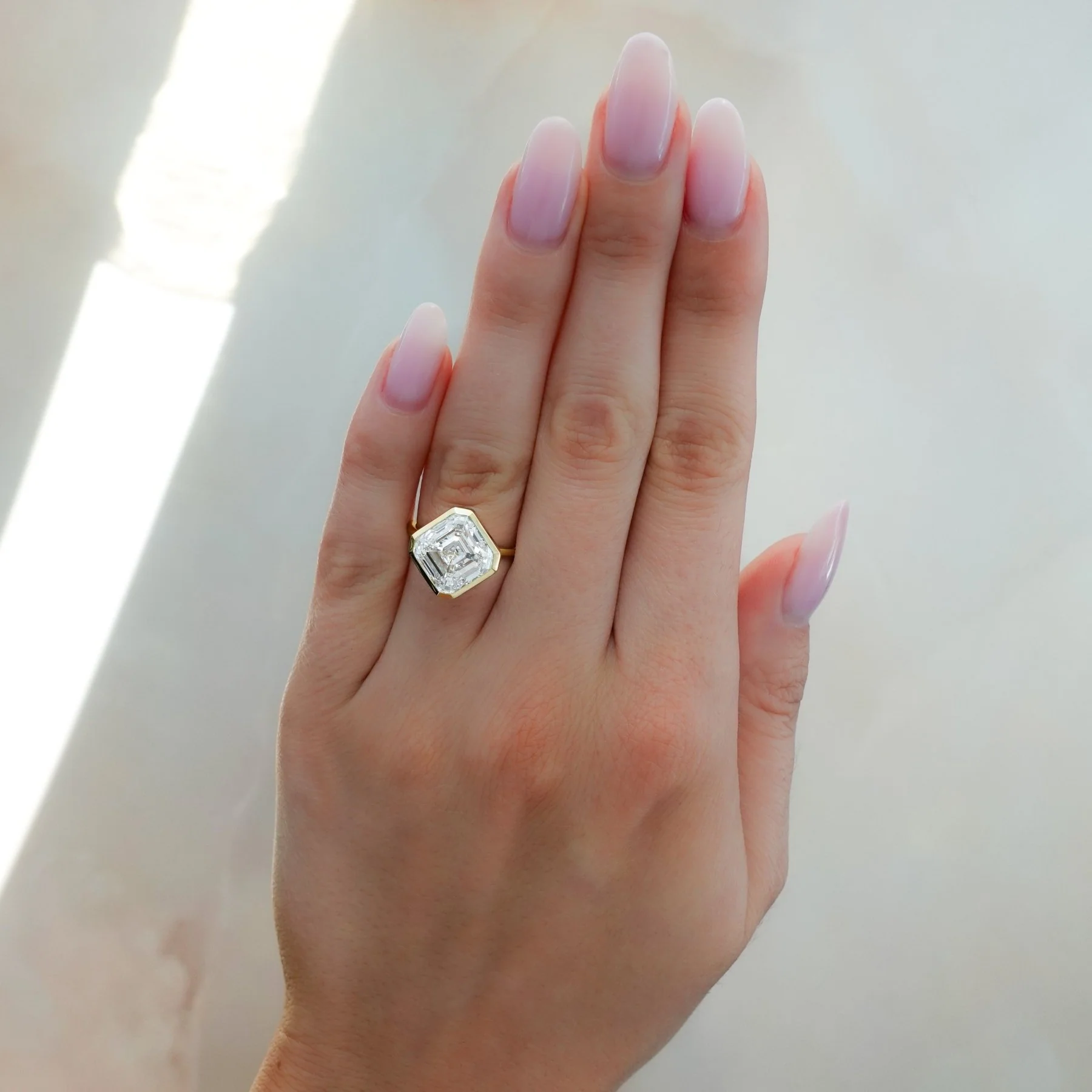 Penumbra Bezel Set Engagement Ring With Tilted Asscher Cut - Image 3