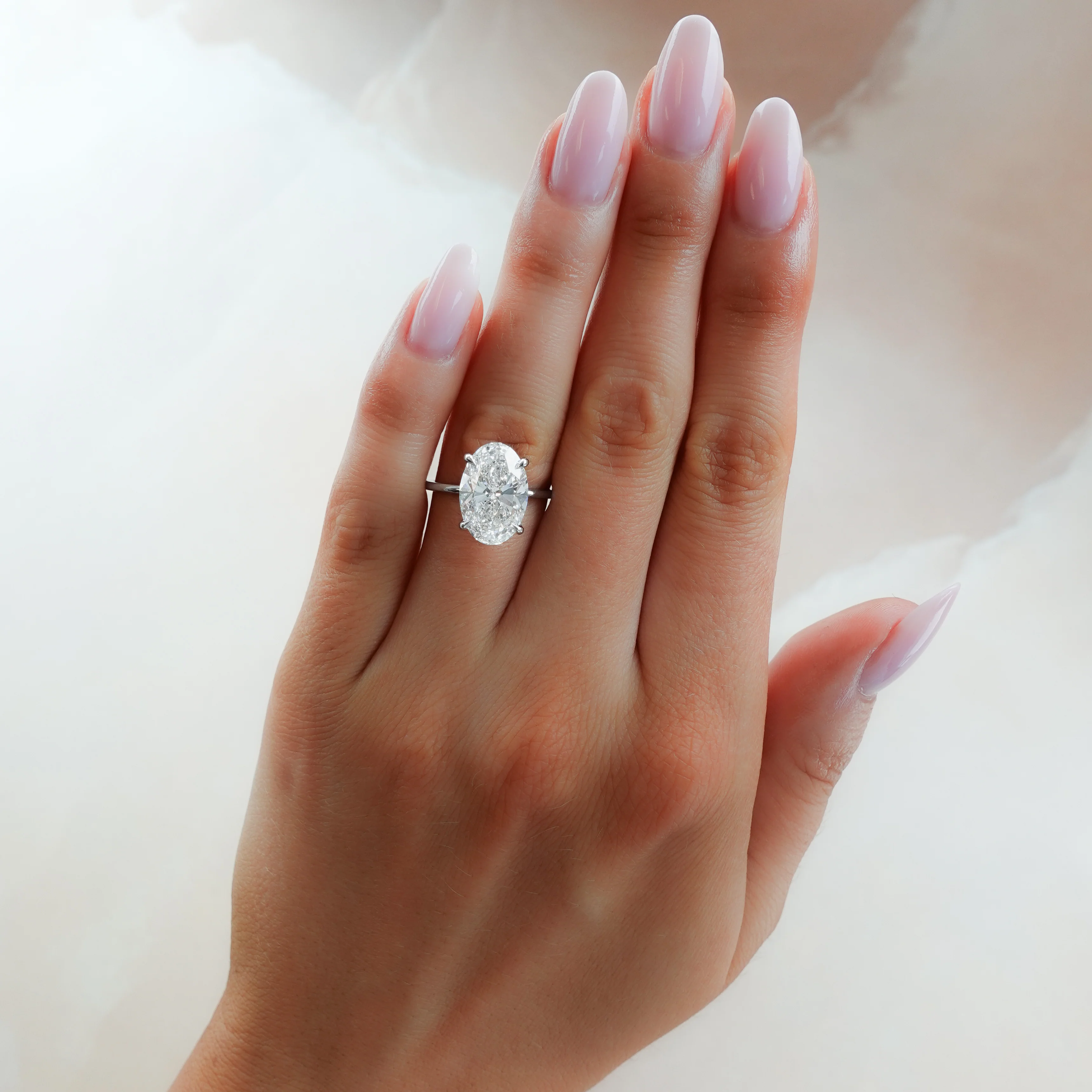 Thin + Simple Solitaire Engagement Ring With Oval Cut Diamond - Image 3