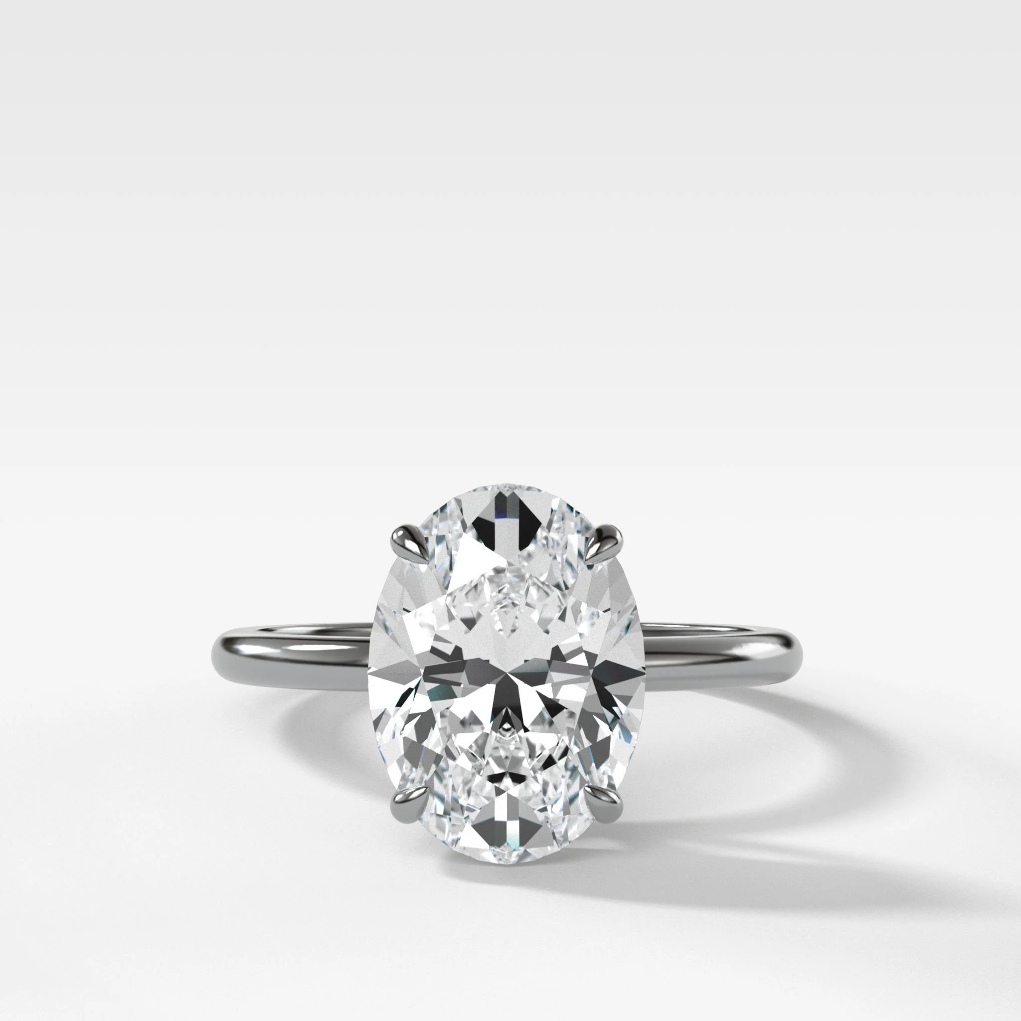 Thin + Simple Solitaire Engagement Ring With Oval Cut Diamond - Image 4