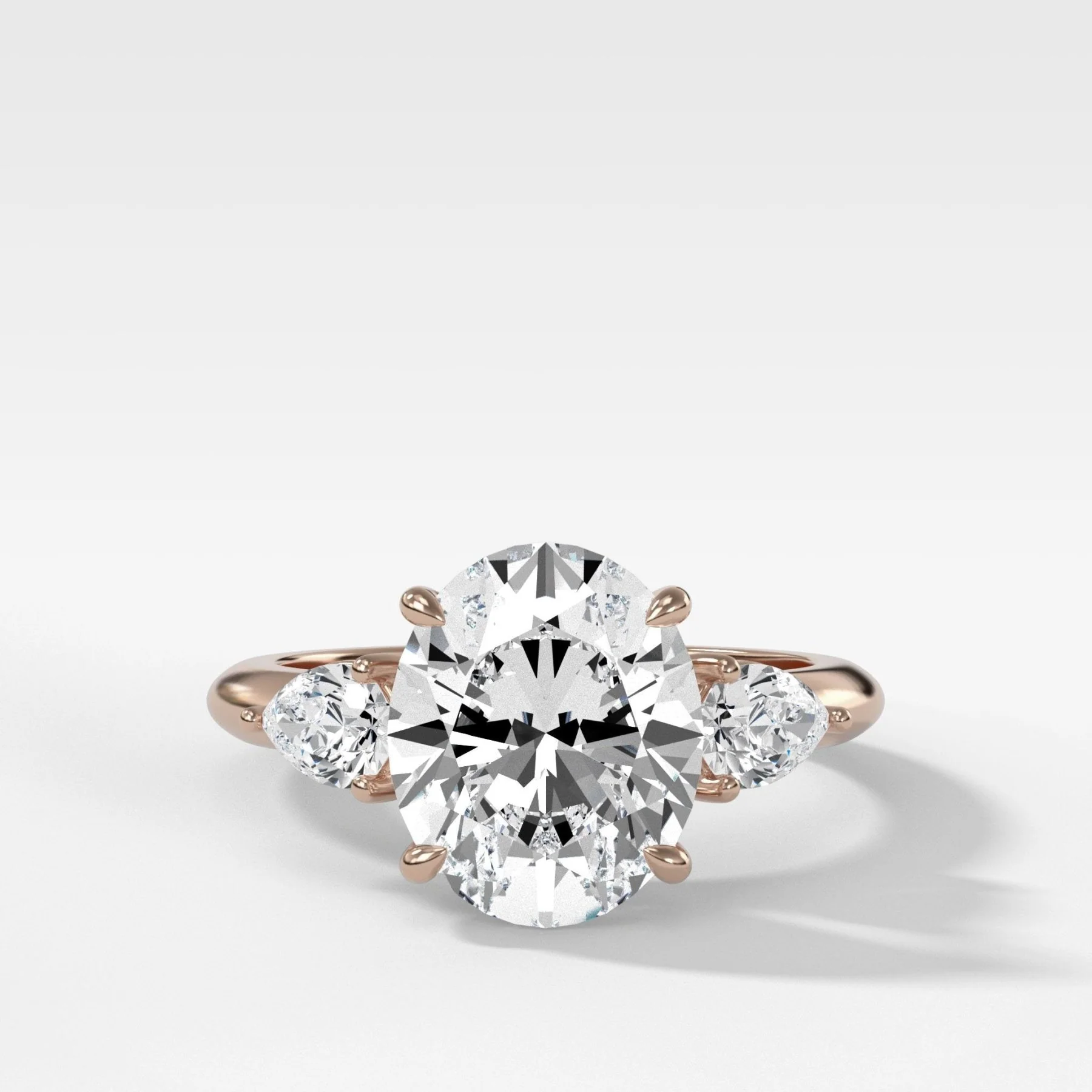 Three Stone Engagement Ring With Pear Side Stones and Oval Cut Diamond - Image 5