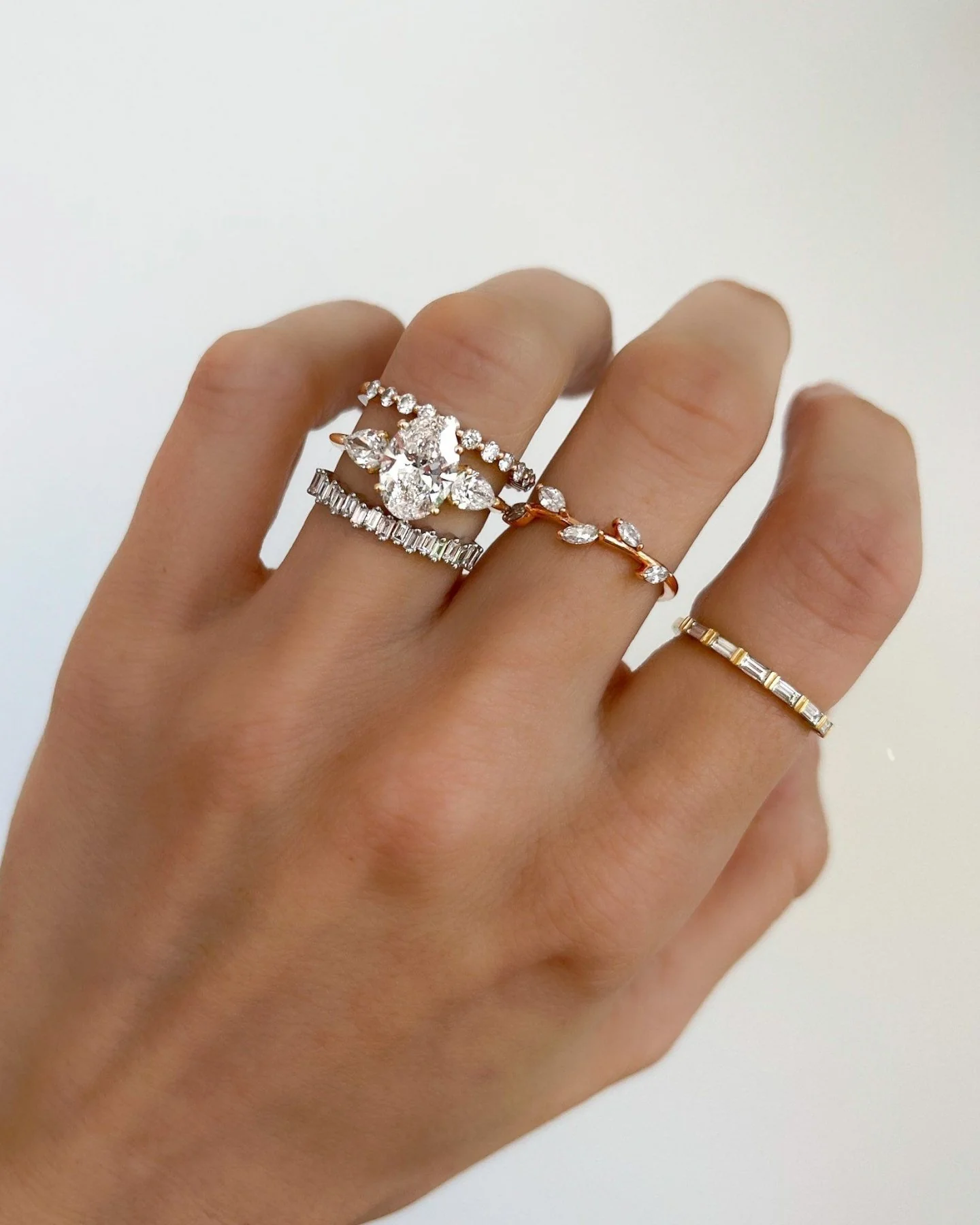 Three Stone Engagement Ring With Pear Side Stones and Oval Cut Diamond - Image 8